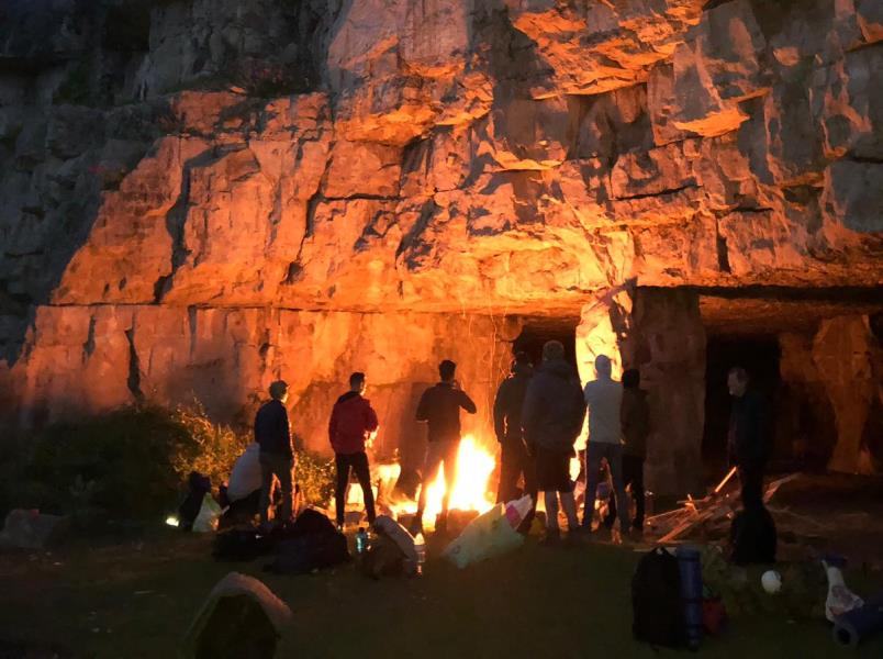 Cave camping near Bournemouth for an adventure stag do weekend